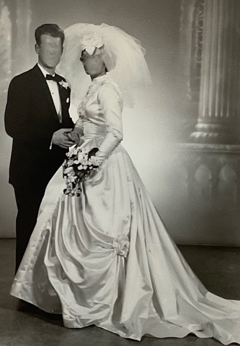 1961 Ivory Satin Long-Sleeved Gown with Draped Sides, Swan-neck Collar, and Flower Accents